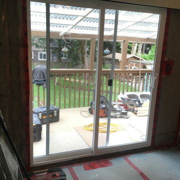 Patio door installed. Insulation and vapour barrier complete.