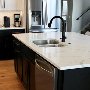 Kitchen with Black Bases and White Uppers in Iowa Quad Cities