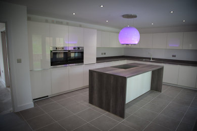 Contemporary kitchen in West Midlands.