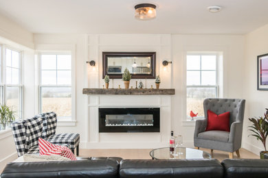 Inspiration for a mid-sized light wood floor and brown floor living room remodel in Other with white walls and no tv