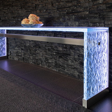 Glass table with LED lights in luxurious residential condo