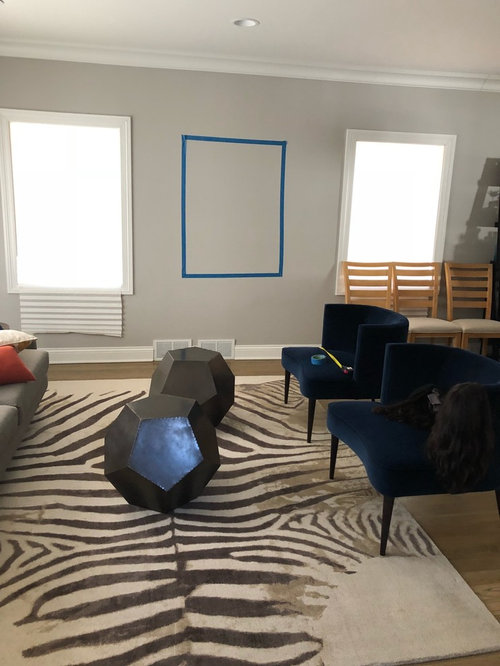 What To Put Between Two Windows In Living Room