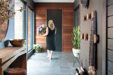 Example of a large trendy entryway design in New York