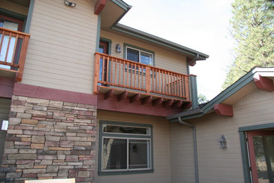 Craftsman beige two-story mixed siding exterior home idea in Phoenix