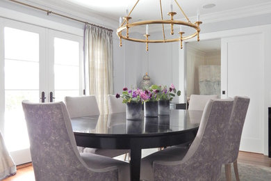 Mid-sized transitional separate dining room in New York with grey walls, dark hardwood floors and no fireplace.