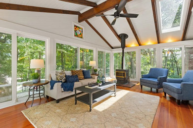 Example of a transitional sunroom design in Boston