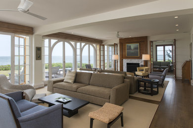 Inspiration for a mediterranean formal and open concept marble floor and brown floor living room remodel in Boston with white walls, a standard fireplace and no tv
