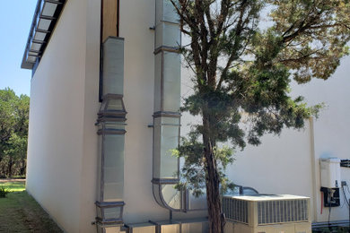 Example of an urban exterior home design in Austin