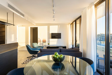 This is an example of a mid-sized modern living room in Sydney.