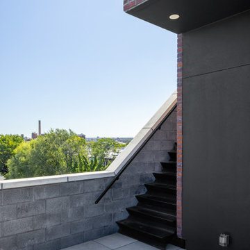 Williamsburg Townhouse - Lower Roof Deck with Stair to Upper Roof Deck