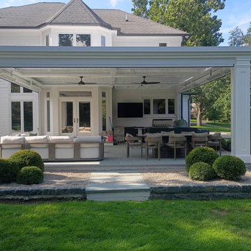 Custom column wrap trim on a motorized louvered pergola
