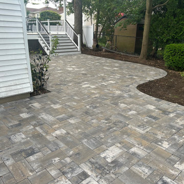 Merrick | Traditional New Nicolock Paver Patio, Fiberon Decking, and Landscaping