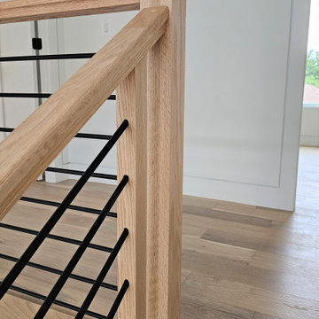Project #108 | Red Oak Staircase in Light-Filled Space