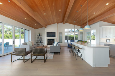 This is an example of a beach style family room in San Diego.