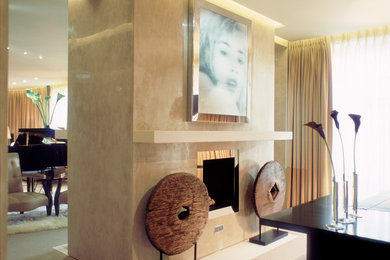 Medium sized contemporary foyer in London with beige walls, marble flooring, a single front door, a medium wood front door, beige floors, a coffered ceiling and a feature wall.