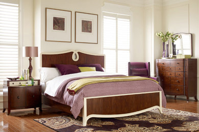 Bedroom - mid-sized transitional master light wood floor bedroom idea in Jacksonville with white walls