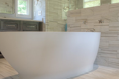 Inspiration for a large transitional master multicolored tile and porcelain tile porcelain tile and multicolored floor bathroom remodel in Atlanta with furniture-like cabinets, gray cabinets, gray walls, an undermount sink and quartz countertops