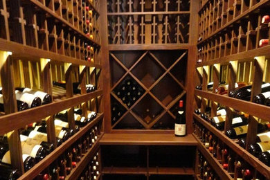 Wine cellar - cork floor wine cellar idea in Los Angeles