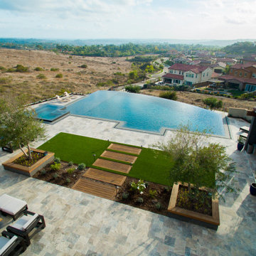 Gorgeous Infinity Pool with Multiple Outdoor Living Spaces