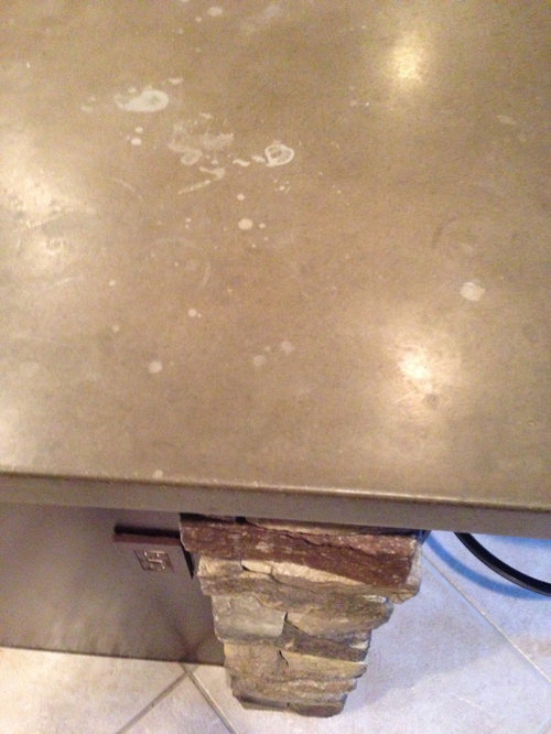 How can I get stains out of a concrete countertop?