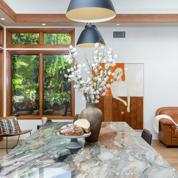 Stone Waterfall Kitchen Island with Pendant Lighting in San Diego