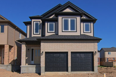 Large traditional exterior home idea in Toronto
