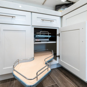 Modern White Shaker Kitchen with Oversized Island & Custom Storage Solutions