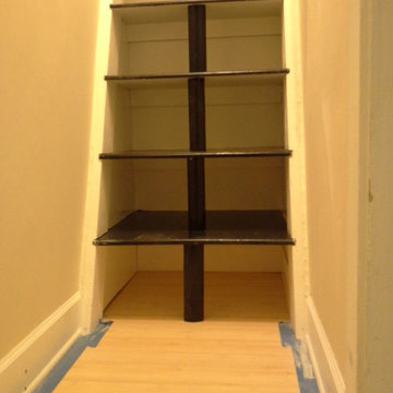 Storage ships ladder in a brownstone walk-up