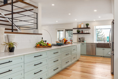 Example of a trendy kitchen design in Calgary