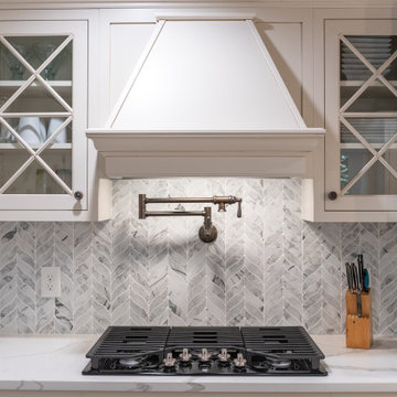 Blue Leaf Mosaic Backsplash with Oiled Bronze Pot Filler