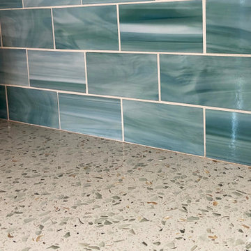 Kitchen countertops featuring Curava recycled glass surfaces in Savaii