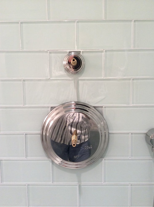Glass tiles in shower appear different close to controls