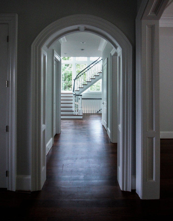 Powerful Impression by Floating Staircase in Suburban Foyer