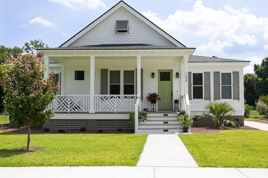 This is an example of a mid-sized traditional exterior in Charleston.