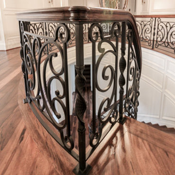 Project #74 | Circular Staircase with Hand-Forged Metal Panels