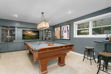 Example of a mid-sized transitional walk-out carpeted and beige floor basement design in Seattle with gray walls