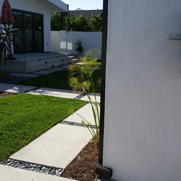 Costa Mesa, New Modern Home. Angle Face 5 inch Gutters, Smooth Downspouts.