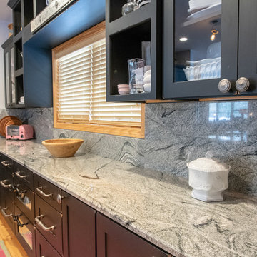 Silver Cloud granite kitchen with full height backsplash
