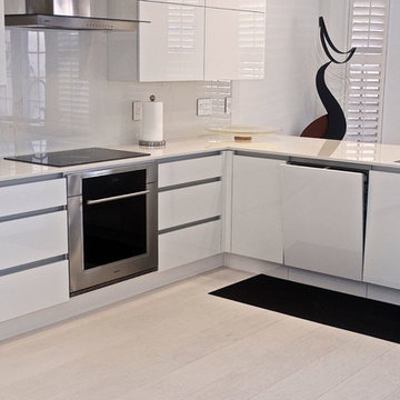 High Gloss Acrylic Kitchen featuring Dekton Countertop