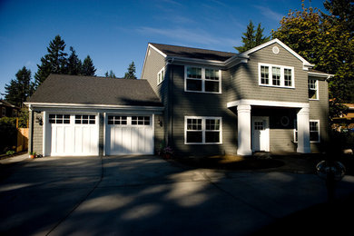 Mid-sized transitional brown two-story wood house exterior idea in Seattle with a hip roof and a shingle roof