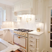 range with hood and cabinets