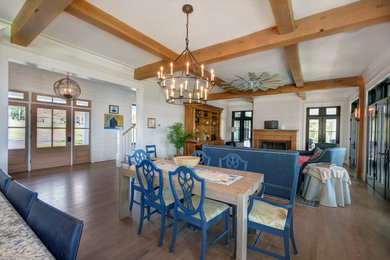 Living room - large coastal open concept medium tone wood floor and brown floor living room idea in Baltimore with gray walls, a standard fireplace, a brick fireplace and no tv