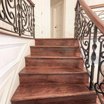 Project #74 | Circular Staircase with Hand-Forged Metal Panels