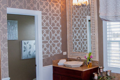 Drop-in bathtub - transitional master porcelain tile drop-in bathtub idea in Chicago with raised-panel cabinets, dark wood cabinets, beige walls and a vessel sink