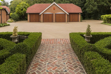 Photo of a traditional garage in Surrey.