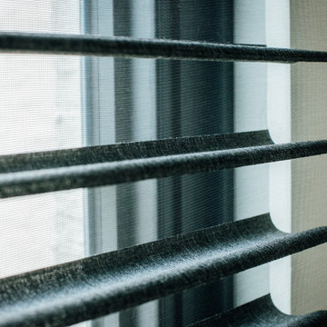 Functional Drapes with 2-Finger Pinch Pleat on a Matte Black Traverse Rod