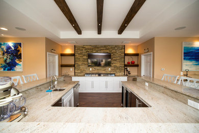 Example of a beach style custom-shaped pool house design in Philadelphia