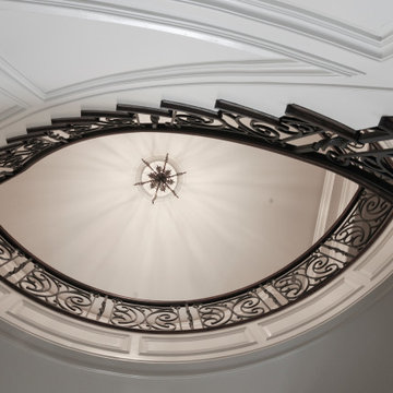 Project #74 | Circular Staircase with Hand-Forged Metal Panels