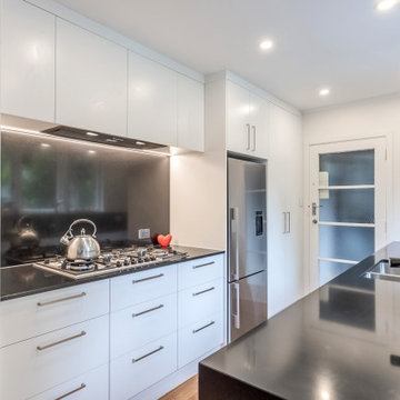 Same material for both the splashback and kitchen benchtop