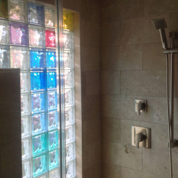 Colored glass block window wall in a Columbus Ohio shower